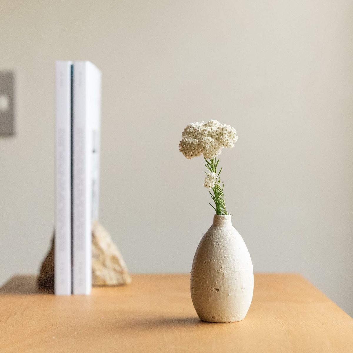 HIBI Artisan Ceramic Bud Vase from Speckled White Collection, showcasing traditional Shigaraki pottery techniques and natural stone inclusions