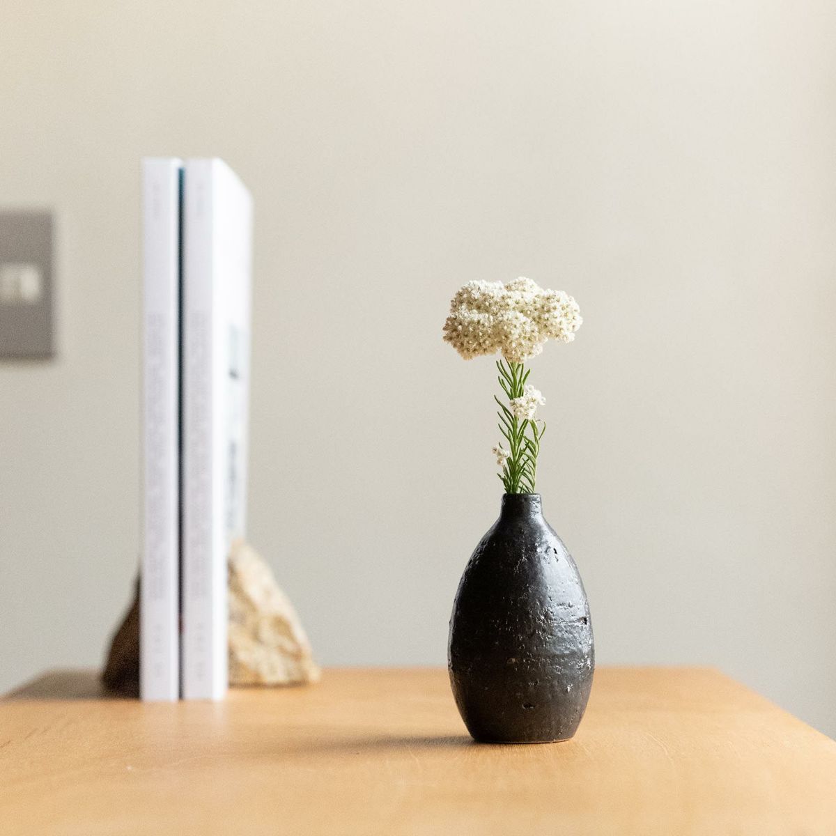 HIBI Artisan Ceramic Bud Vase from Speckled White Collection, showcasing traditional Shigaraki pottery techniques and natural stone inclusions