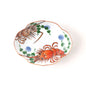 Handcrafted Japanese oval plate featuring vibrant red lobsters, green seaweed, and blue accents on a white background with scalloped edges