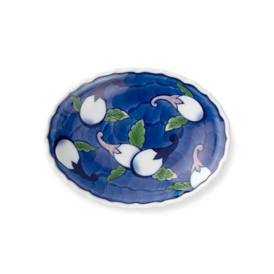 Large handcrafted Japanese oval platter featuring intricate white eggplant blossom design on deep blue background, perfect for serving and display