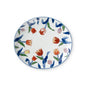 Handcrafted Japanese oval ceramic plate featuring vibrant red tulips and blue leaves on a white background, perfect for serving and display