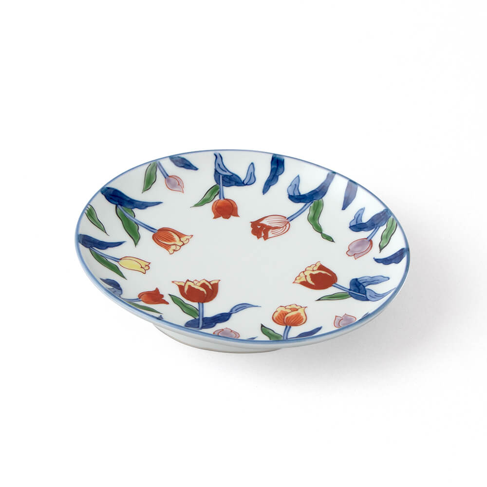 Handcrafted Japanese oval ceramic plate featuring vibrant red tulips and blue leaves on a white background, perfect for serving and display