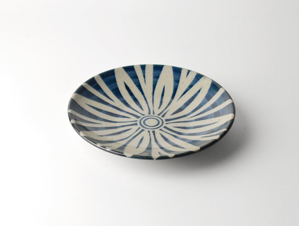 Handcrafted 6-inch round ceramic plate with Persian-inspired floral motif in Kurosu blue, showcasing traditional Japanese kanna-biki technique