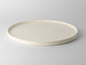 Lotus Large Ceramic Serving Plate in Soft White, showcasing minimalist design for elegant dining