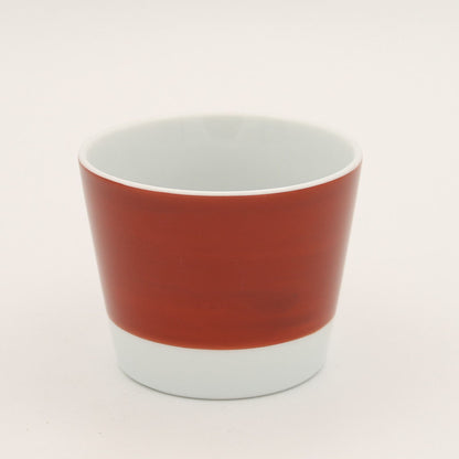 Mede-Tai Choku sake cup featuring a vibrant red exterior, pristine white interior, and elegant silver rim, embodying good fortune in Japanese drinking culture